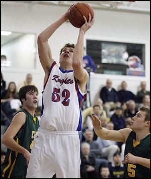 St. Francis' Storm Stanley puts up a shot before Clay's Stefan Gaskins, right, can get to him. Stanley scored 13 points.
<BR>
<img src=http://www.toledoblade.com/graphics/icons/photo.gif> <font color=red><b>VIEW</font color=red></b>: <a href=