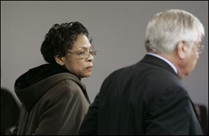 Cynthia A. Anderson, 66, in court with lawyer Sheldon Wittenberg, faces one count of aggravated vehicular homicide. 