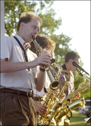Stanley George performs on his soprano sax with the local quartet Sax 4th Avenue. The group performs this weekend in the Peristyle.