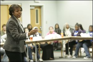 Crystal Harris of the YMCA's Youth Opportunities program speaks on ways to be engaged in education. Yesterday's ‘Momentum 2010' drew more than 170 girls from all over northwest Ohio.