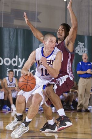 Scott Perkins drives the lane for Lake Superior State against Philadelphia University. The Perrysburg graduate looks back fondly on his career as a Laker.