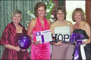 Anne Gregory, right, with friends LeaAnn Hayes, Cindy Brown, and Becky Holtsberry at Mrs. Gregory's Cinderella Ball, a fund-raiser for the American Cancer Society.