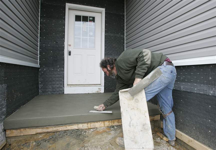 Housing-under-construction-near-shopping-in-Monclova-Township