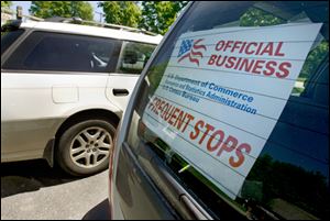 Signs like this one on a vehicle in  Dummerston,  Vt., will be seen throughout the metro Toledo area as the 2010 census progresses. It is 'as accurate a count as possible,' said John Willse, a Census Bureau spokesman.