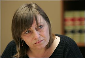 Victoria Bigelow, seeking disability designation, is among plaintiffs suing the Department of Job and Family Services.