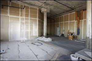 A unit on the seventh floor provides a blank canvas for a buyer to specify details and finishes. Granite countertops are featured in another seventh-floor unit. 
