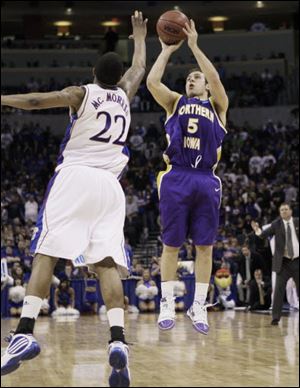 Northern Iowa's Ali Farokhmanesh shoots over Kansas' Marcus Morris as the Panthers upset KU.