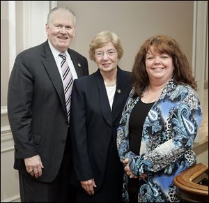 Jefferson Award winners from left, Donald Harbaugh, volunteer and supporter of the Boys and Girls Club of Toledo,  Dr. Elizabeth Ruppert, advocate for the health education and advancement of children, and Doris Turner, President of Hannah's Socks, pose Thursday, April 1, 2010, after receiving their awards at the Toledo Club.  The fourth recipient, Fred Grimm, co-founder of the DOVE Fund, was not present.