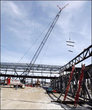 Construction crews work on what will be the Stroh Center on the Bowling Green State University campus. 