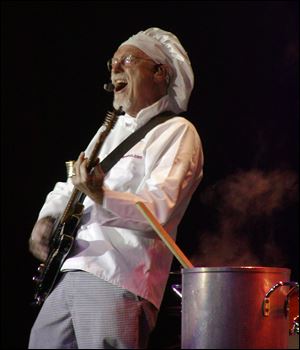 Bill 'Sauce Boss' Wharton is known for cooking on stage as he plays. He started the routine to promote his hot sauce in 1990.
