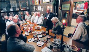 Tile Club meetings include a steak dinner and plenty of conversation.