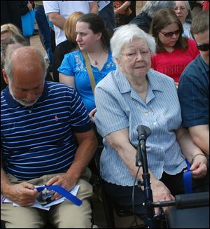 Russell Miller, brother of slain KSU student Jeffrey Miller, and Florence Schroeder, mother of William Knox Schroeder, attend a memorial ceremony on the Kent State campus.