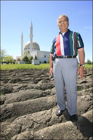 Mohamed Youssef is helping start the first garden at the Islamic Center of Greater Toledo. 'If we do this, we can give the food bank the vegetables and produce from our land.'