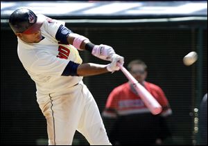 Cleveland's Andy Marte hits a sacrifice fly off  Detroit reliever Ryan Perry. The third baseman also recorded a triple and two RBIs.