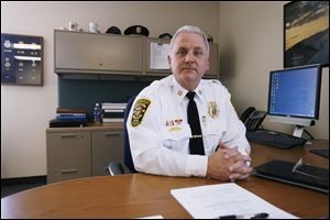 CTY sylchief17p Sylvania Police Captain Rhodus, who will become Sylvania's new police chief on April 26,  in the police department in Sylvania, Ohio on March 16, 2010. Jetta Fraser/Toledo Blade