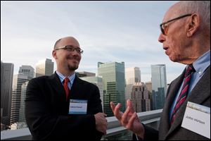 Gabriel Metcalf, left, says his hometown's city-county government has its problems but overall is effective. The executive director of San Francisco Planning and Urban Research Association met recently with a predecessor, founding Executive Director John Hirten. 