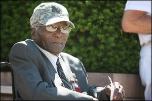 Johnnie Harris, 85, a World War II veteran, wears the medals he earned during his service in the Army.
<br>
<img src=http://www.toledoblade.com/graphics/icons/photo.gif> <font color=red><b>PHOTO GALLERY</b></font>: <a href=