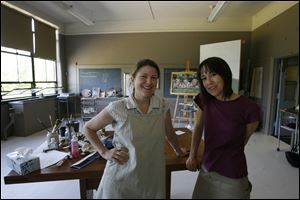 Jennifer Giovannucci, left, of Waterville, and Teri Utz Bersee of Waterville Township, want to save the Dudrow building in which they promote art and pottery.