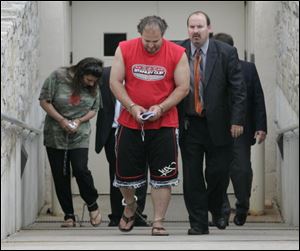 Akl and her husband, Hor Akl, who were arrested last week, have pleaded not guilty to charges in a 36-page indictment.