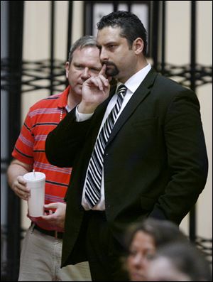 The face of rival Jeff Simpson reflects the intensity of the night.