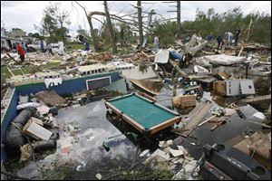 Although climatologists are certain more violent weather events lie ahead, they are less sure that we'll have more tornadoes, like the EF-4 twister on June 5 that wrecked this Millbury home.