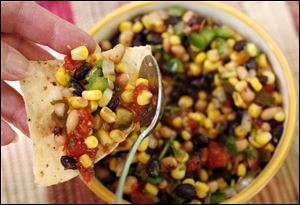 Slug: fud FOOD10p B  The Blade/Jeremy Wadsworth  Date: 06/10/10  Caption:  Cowboy Caviar Thursday, 06/10/10, in Toledo, Ohio.