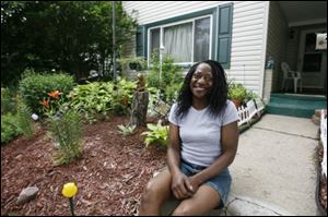 Pam Morris in her Old South End garden.