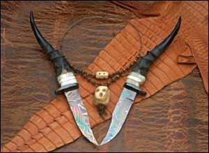 Jim Parker, who took best in show at last year's festival, crafted these knives with Damascus black buck handles.