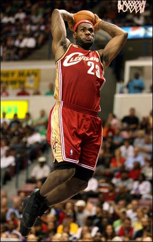 LeBron James of the Cleveland Cavaliers goes for a dunk.
