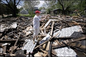 Robert Vander Horst's home on Wasaon Street caught fire last month after an arsonist set fire to a vacant house next door.