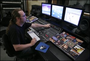 Christopher Stoll is among dozens of musicians and singers who came together at the Zeta Recording Studio in Holland to re-record a musical tribute to America's military veterans.