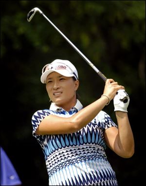 Se Ri Pak, of South Korea, watches her tee-shot on the par-3 ninth hole during the second round of the LPGA Championship golf tournament at Locust Hill Country Club in Pittsford, N.Y. on Friday.