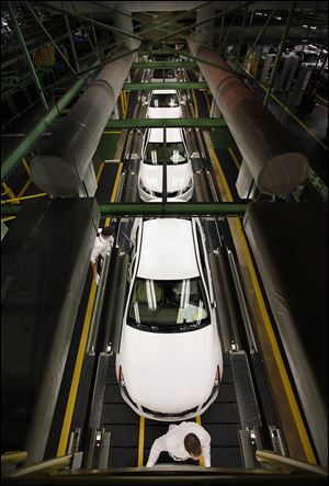 Honda Accords roll toward final inspection before they leave the Marysville, Ohio, assembly plant.