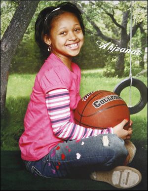 Ahjzanae completed fifth grade at Emmanuel Christian Academy. Her mother, Alesia Abbott, described her as a helper. 