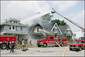 Fire crews ballte a blaze at 614 Oak St. in East Toledo.
