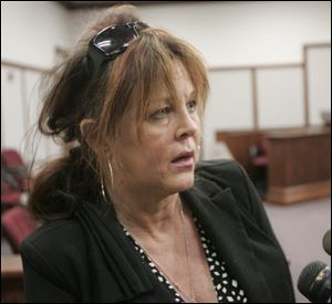  Robin Vess talks about being convicted of 42 counts of animal cruelty in Ottawa County Municipal Court in Port Clinton on April 30.