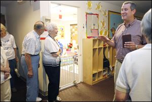 Rev. Fortune shows off the church's preschool area. It also has a school for kindergarten through eighth grade.