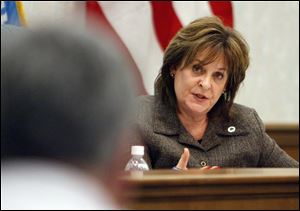 Carol Contrada considers the construction job temporary.