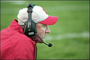 Bedford Coach Jeff Wood says the team's four ‘captain's practices' this year are a tradition that helps get the players in shape. The coaches watch the practice. 
