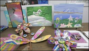 Among the new work that Lott Industries' employees are pursuing is art, including these pieces that will soon be on display at a gallery in downtown Toledo on North St. Clair Street.