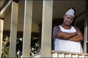 Ybonne Blackwell says she misses seeing Cindy Sumner waving to her as she rode by on her bike. Ms. Blackwell hopes that the warehouse will be torn down in Ms. Sumner's 'loving memory.'