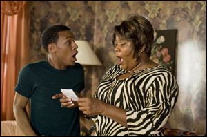 Bow Wow, left, and Loretta Devine are shown in a scene from 