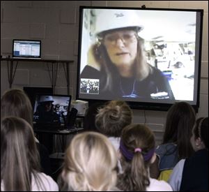St. Ursula students watch science teacher Jackie Kane's Webinar from a research vessel located off the shore of British Columbia.