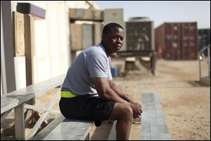 ‘The way I look at it, it's my job,' says  Staff Sgt. Trevino D. Lewis, dismissing the shifting rationales for the war that came and went over its seven-year duration.