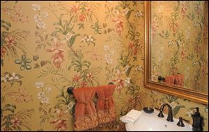 The wallpaper in Lisa Tomasovich's first-floor powder room.