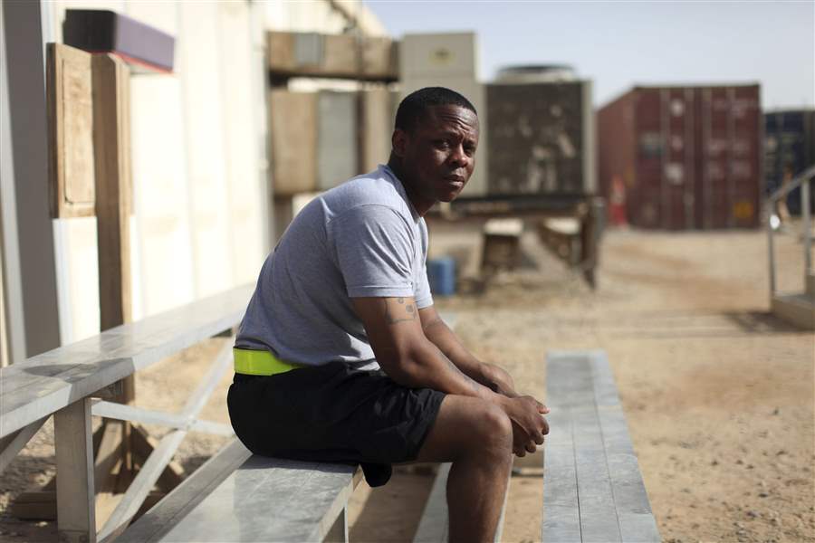 Staff-Sgt-Trevino-D-Lewis-of-Milledgeville-Ga-sits-after-working-out-in-a-gym-at-Camp-Liberty-on-Baghdad-s-outskirts-in-Iraq