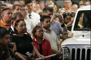 Several hundred Jeep workers listen to Vice President Joe Biden at the Toledo Jeep Assembly complex. He drew cheers when he told them he's owned Jeeps continuously since 1973. 