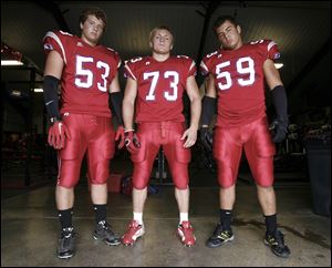 Patrick Henry has claimed at least a share of the NWOAL title for eight straight seasons. Hoping to continue that streak are seniors, from left, Mitchell Schulze, Xavier Dye and Josh Almanza.