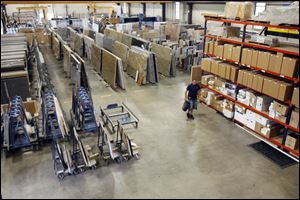 Residential customers are able to visit Cutting Edge to select from its inventory of natural stone slabs and other materials. 