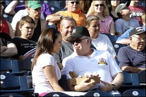 Actors Annabeth Gish, left, and Wayne Duvall rehearse a scene for the movie 'Home Run Showdown,' portions of which are being filmed at Fifth Third Field.
